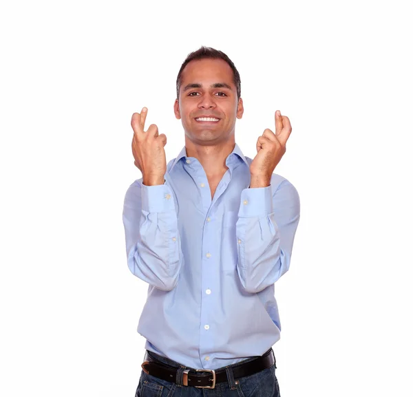 Smiling adult man crossing his fingers — Stock Photo, Image