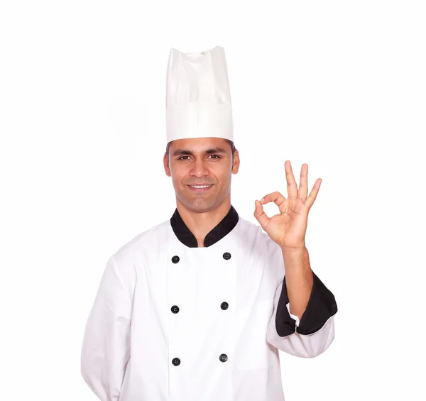 Affascinante ragazzo chef gesturing ok segno con le dita — Foto Stock