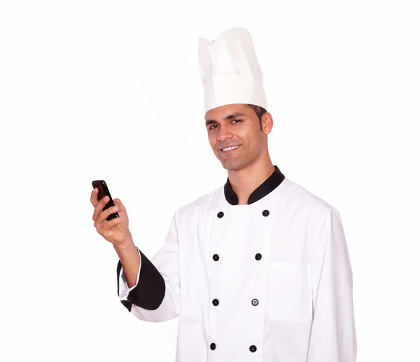 Homens encantadores em uniforme chef mensagens de texto no celular — Fotografia de Stock