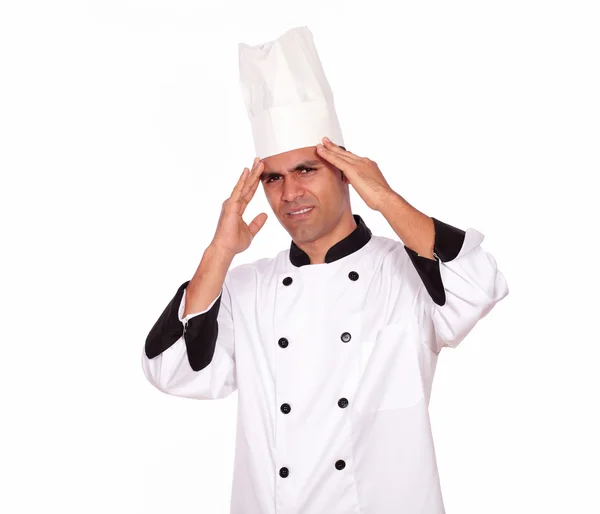 Tired male cook standing with headache — Stock Photo, Image