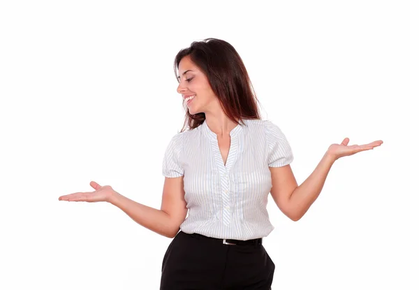 Smiling woman looking right with palms up — Stock Photo, Image