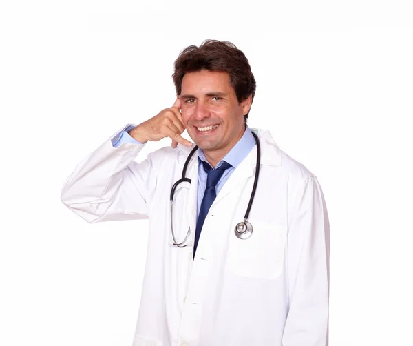 Charming medical doctor gesturing call me — Stock Photo, Image