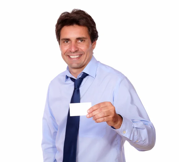 Executive man holding up his blank business card — Stock Photo, Image