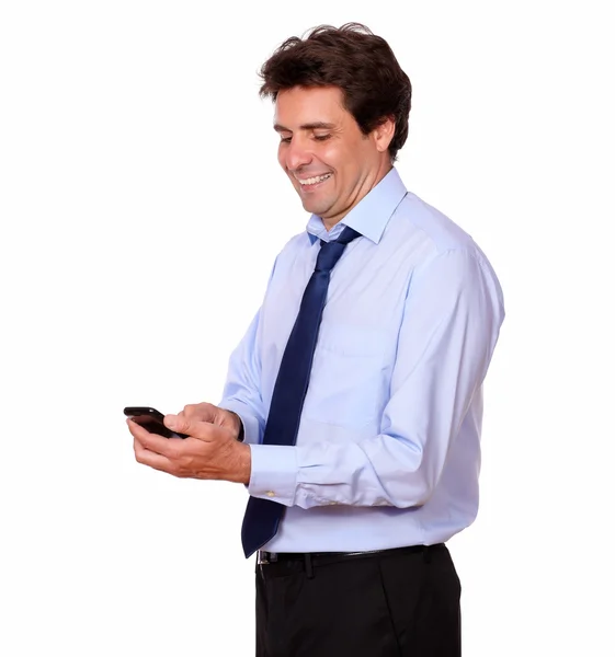 Adult man sending message by cellphone — Stock Photo, Image