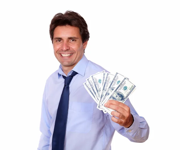 Attraktiva affärsman som håller upp kontanter — Stockfoto