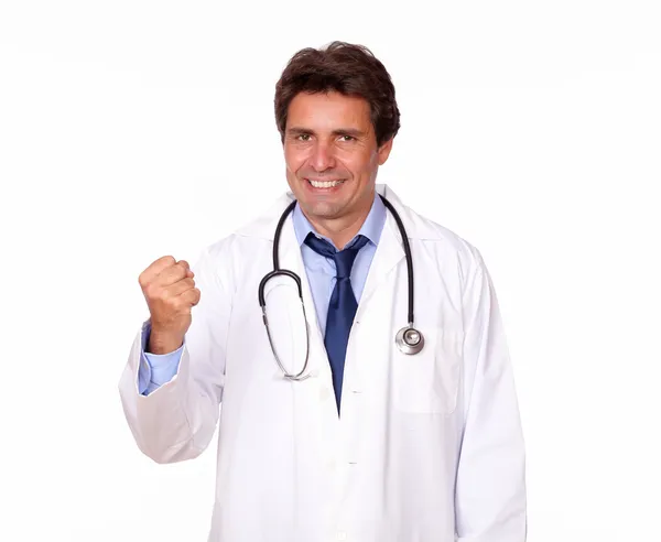 Médico positivo de pie en uniforme blanco —  Fotos de Stock
