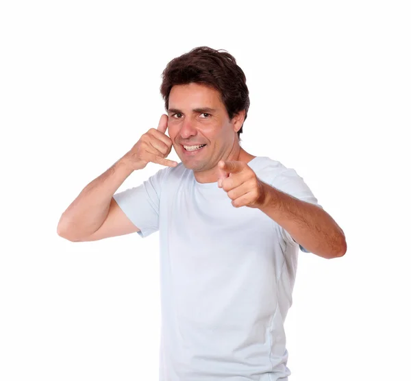 Smiling male gesturing call me with one hand — Stock Photo, Image