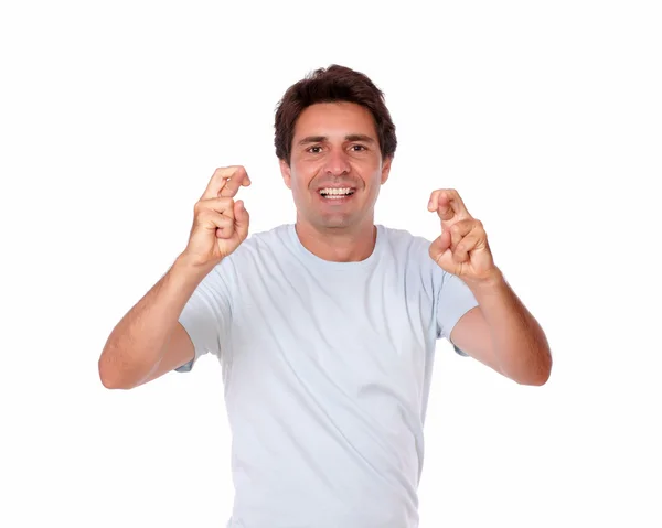 Attractive male crossing fingers for luck — Stock Photo, Image