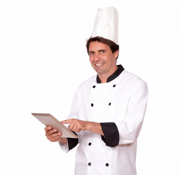 Cocinero profesional trabajando en PC tableta — Foto de Stock