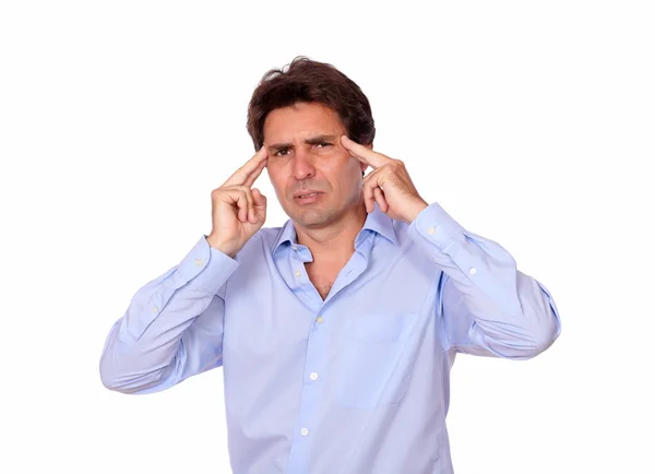 Tired male standing with a tension headache — Stock Photo, Image