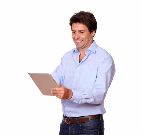 Charming adult man working on tablet pc — Stock Photo, Image