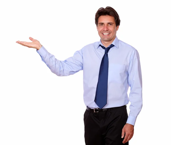 Stylish businessman with tie holding palm out — Stock Photo, Image