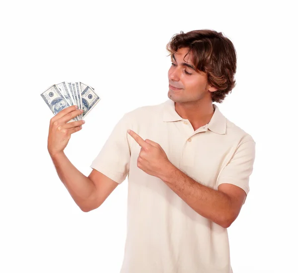 Carismático joven adulto sosteniendo dinero en efectivo — Foto de Stock