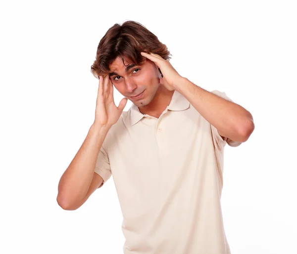 Moe knappe jonge man met een hoofdpijn — Stockfoto