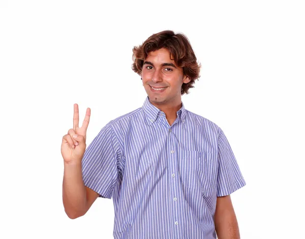 Attractive hispanic man smiling with victory sign — Stock Photo, Image