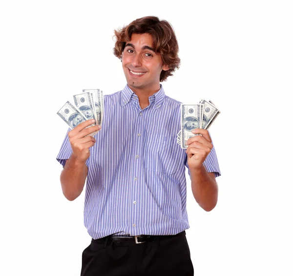 Smiling young man holding cash dollars — Stock Photo, Image