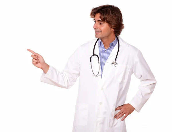 Professional medical doctor pointing to his right — Stock Photo, Image