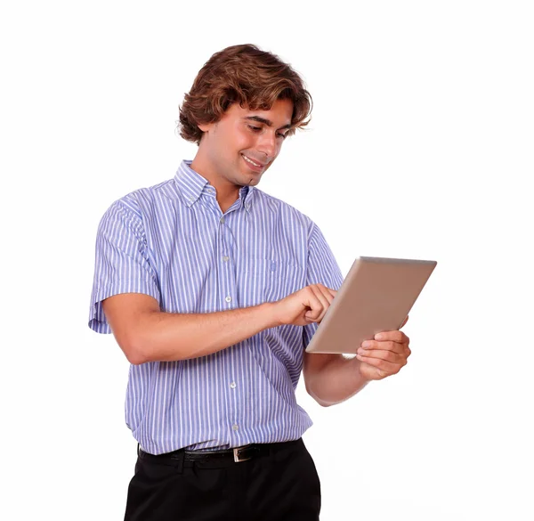 Handsome young man working on his tablet pc — Stock Photo, Image