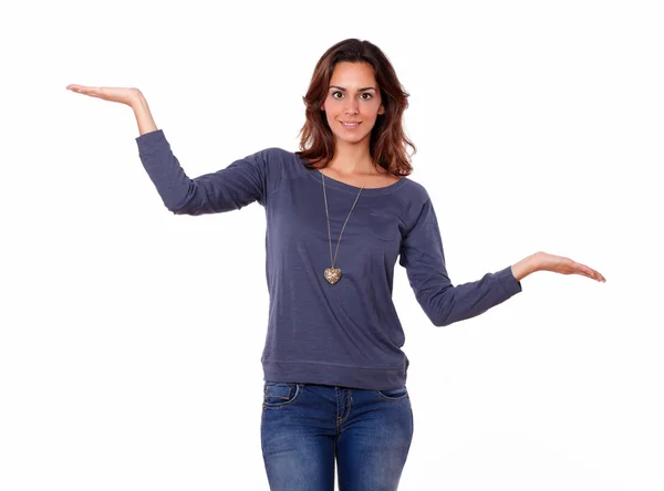 Gorgeous hispanic woman holding palms out — Stock Photo, Image