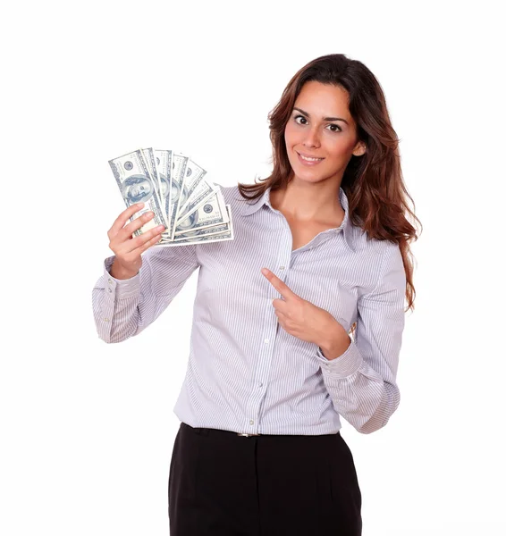 Mujer joven encantadora sosteniendo dólares en efectivo — Foto de Stock