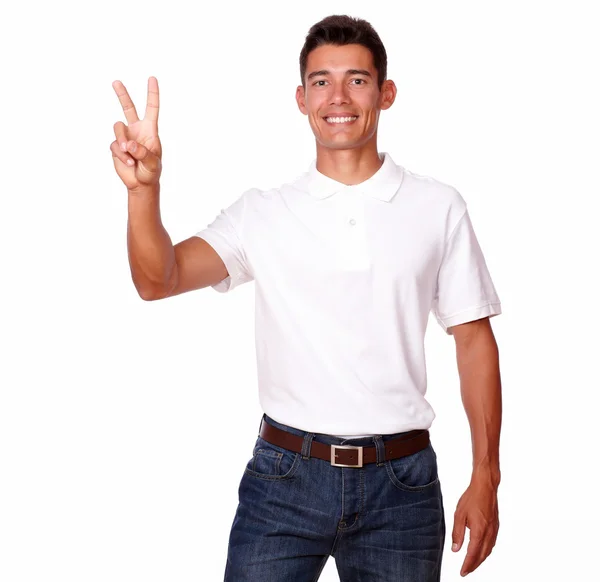Cheerful adult with finger gesture is smiling. — Stock Photo, Image