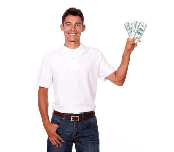 Charmanter lateinischer junger Mann hält Dollars. — Stockfoto