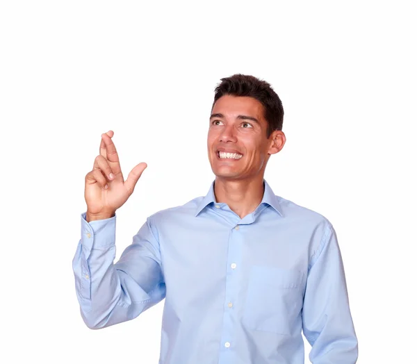 Charismatic man standing and crossing fingers — Stock Photo, Image