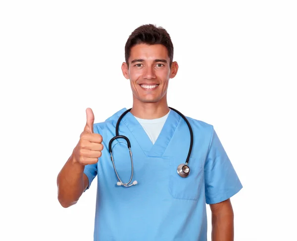 Lächeln Krankenschwester in Uniform gestikuliert positives Zeichen — Stockfoto