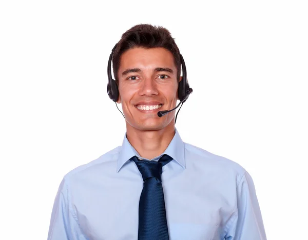 Young hispanic businessman speaking on headphones — Stock Photo, Image