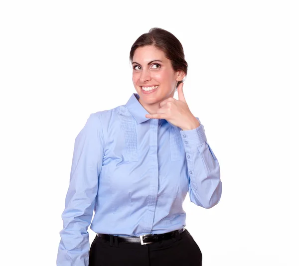 Stylish woman smiling with call gesture — Stock Photo, Image