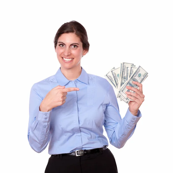 Woman pointing to money — Stock Photo, Image