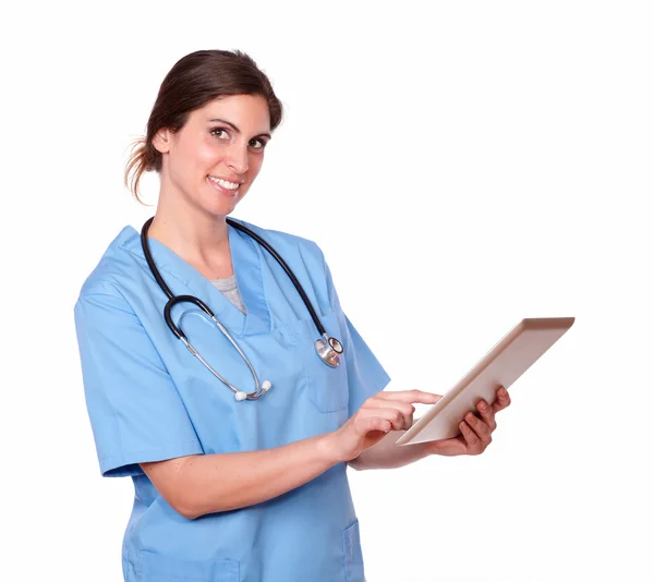 Lovely charming young nurse with tablet pc Stock Photo