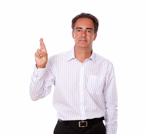 Mature hispanic man with luck sign — Stock Photo, Image