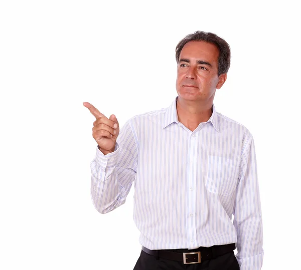 Charismatic man pointing to his right — Stock Photo, Image