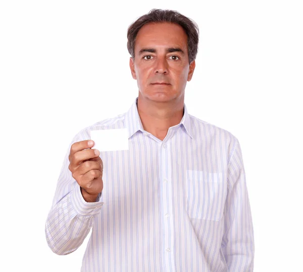 Senior person holding a blank business card — Stock Photo, Image