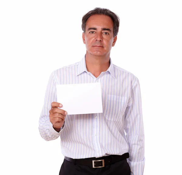 Sophisticated senior man holding a blank card — Stock Photo, Image