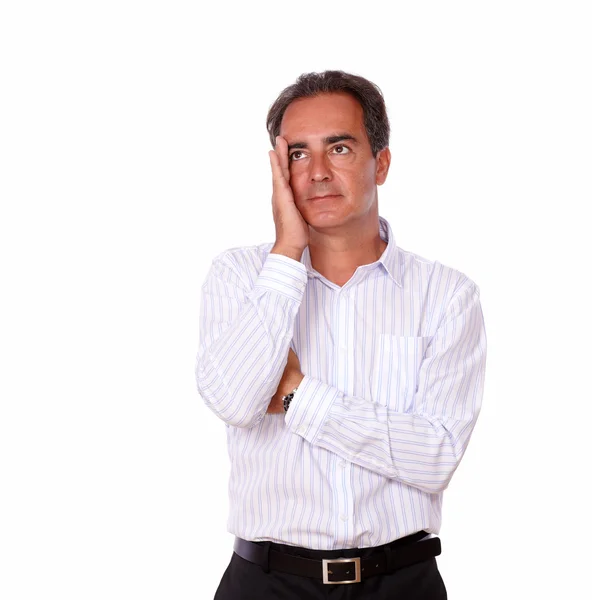 Pensive stressed hispanic man looking up — Stock Photo, Image