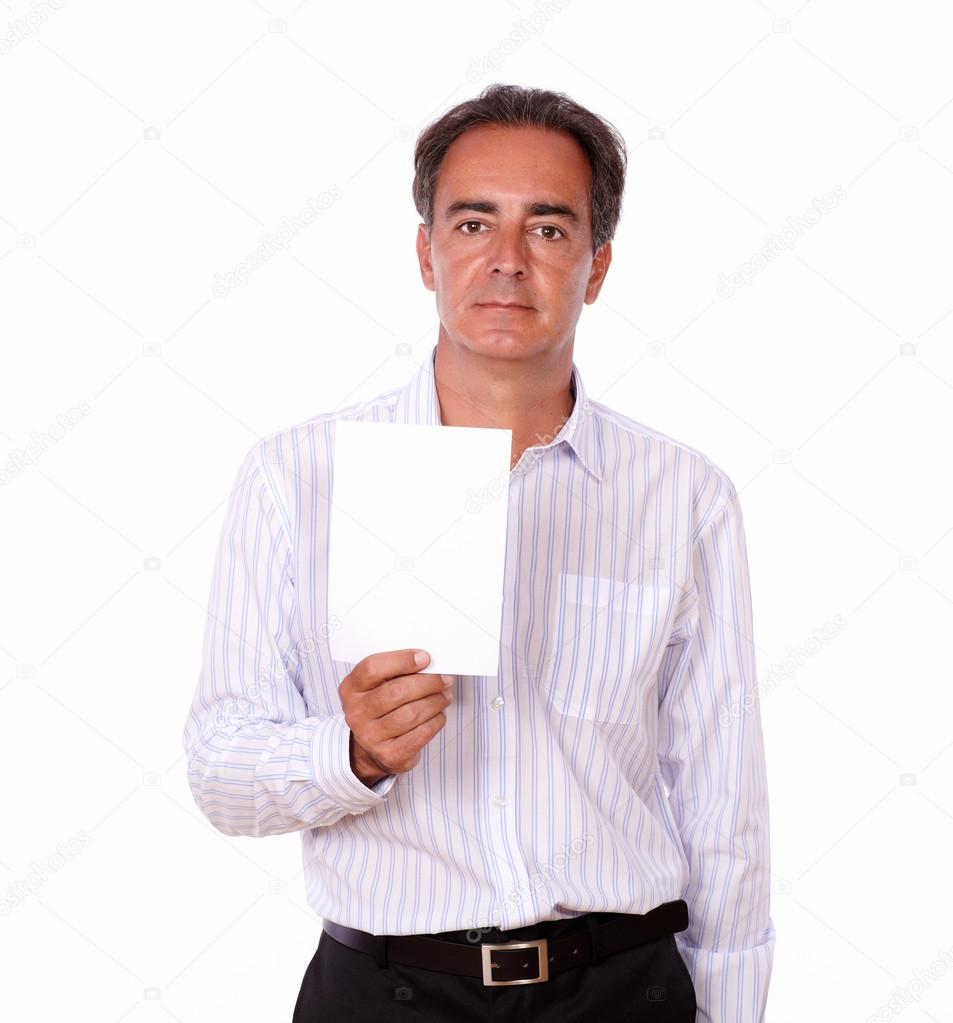 Adult charismatic male holding a white card