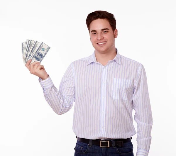Adult man smiling and holding money — Stock Photo, Image