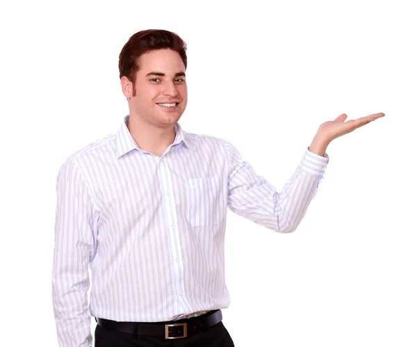 Cute guy holding out his left hand — Stock Photo, Image
