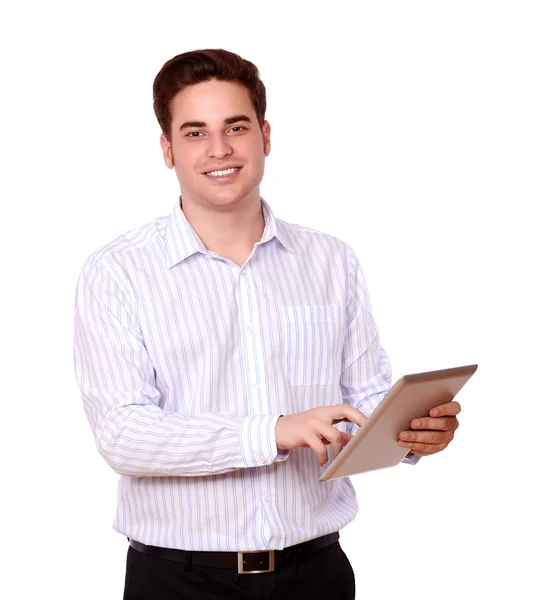 Attractive young male using his tablet pc — Stock Photo, Image