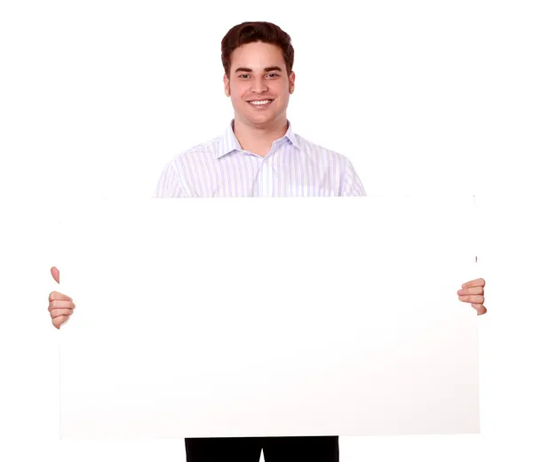 Adult redhead man holding a white placard — Stock Photo, Image