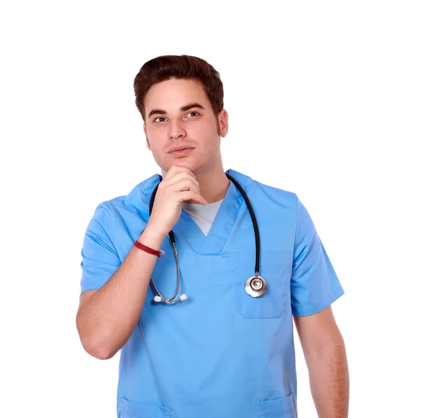 Reflective redhead nurse man looking at people — Stock Photo, Image