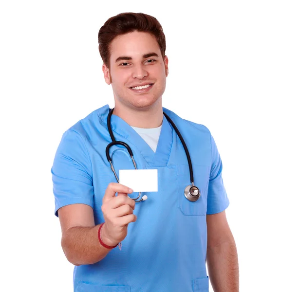 Professional nurse man holding a blank card — Stock Photo, Image