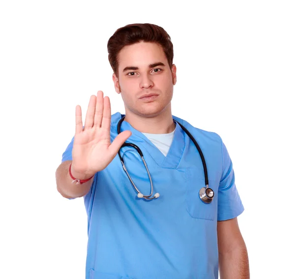 Серйозна чоловіча медсестра з високим жестом — стокове фото