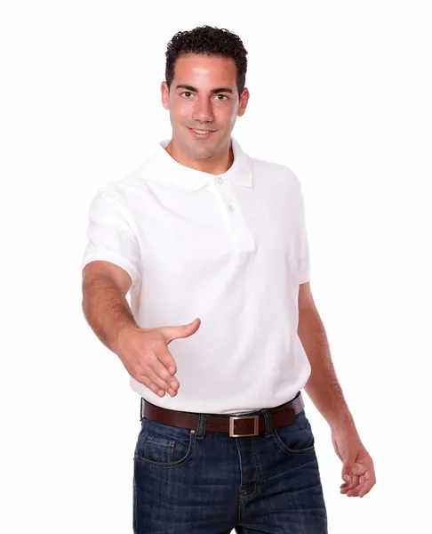 Attractive young guy with greeting gesture — Stock Photo, Image