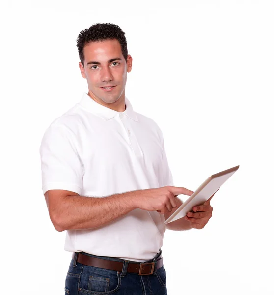 Attractive young man using his tablet pc — Stock Photo, Image