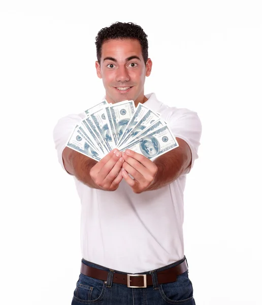 Bonito homem de pé e segurando dinheiro — Fotografia de Stock