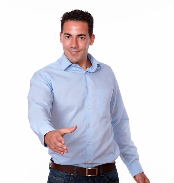 Charismatic male standig with greeting gesture — Stock Photo, Image