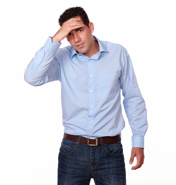 Tired hispanic guy with headache standing — Stock Photo, Image